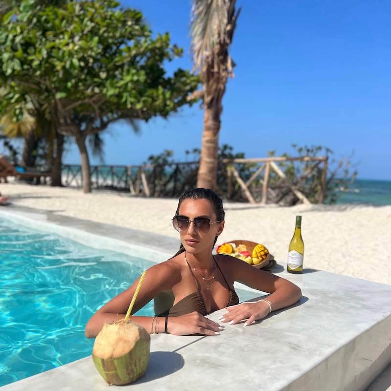 Guest relaxing in the private pool of Villa 01, Solymar Zanzibar